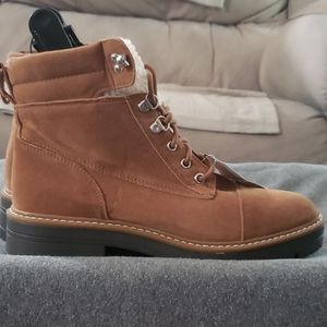 Brand new tan lace up fur lined boots